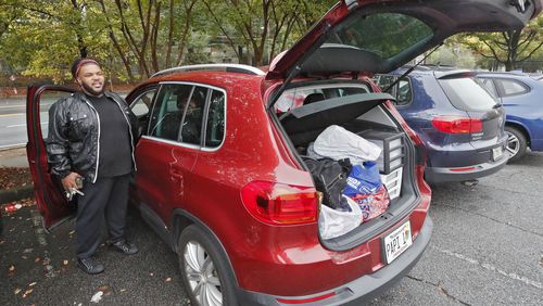 October 16, 2019 - Atlanta - Caleb Hobbs, 29, has many of his possessions organized in his car.  He is homeless and has been staying at friends' homes and occasionally out of his car. The closure of nonprofit contractor Living Room has left more than two dozen counties in and around metro Atlanta with no central intake for the $23 million Housing Opportunities for Persons with AIDS program.  Bob Andres / robert.andres@ajc.com