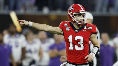 Former Georgia quarterback Stetson Bennett hid behind a brick wall when approached by police prior to his arrest on charges of public intoxication in Dallas, Texas, in January, according to the incident report released Wednesday. (Jason Getz file photo / Jason.Getz@ajc.com)