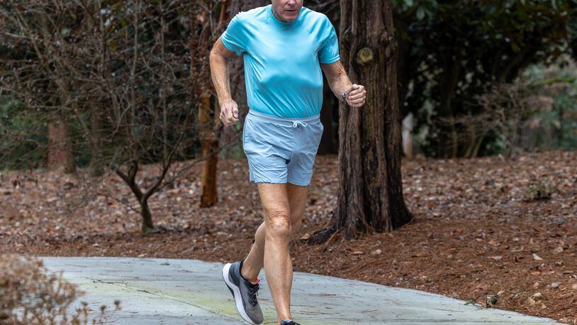 In December, Larry Guzy reached a record of running a 10K a day or the equivalent for 1,000 days.   PHIL SKINNER FOR THE ATLANTA JOURNAL-CONSTITUTION