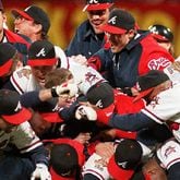 Braves players celebrate winning the 1995 World Series.