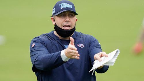 FILE - Tennessee Titans offensive coordinator Arthur Smith instructs his players during NFL football training camp in Nashville, Tenn., in this Friday, Aug. 21, 2020, file photo. (AP Photo/Mark Humphrey, Pool, File)