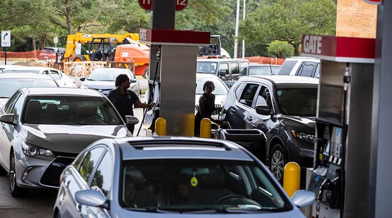 TALLAHASSEE, FL -  Drivers line up for gasoline as Hurricane Michael bears down on the northern Gulf coast of Florida in Tallahassee, Florida. Michael was forecast to become a Category 3 storm with sustained winds of 120 mph when it makes landfall in the Florida panhandle Wednesday.  (Photo by Mark Wallheiser/Getty Images)