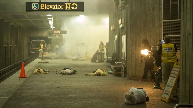Muzzle flashes lit up the platform at MARTA's Midtown Station during the emergency preparedness exercise. Here, the actors portraying terrorist attackers, were pinned down by MARTA police. This standoff lasted for several minutes.