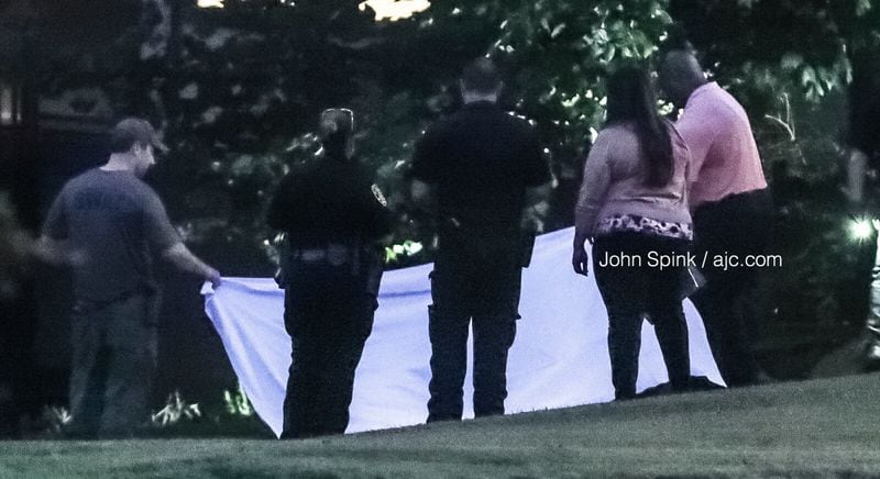 The alleged intruder was dead at the scene, according to South Fulton police. JOHN SPINK / JSPINK@AJC.COM