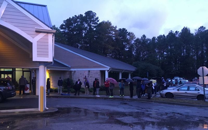At least 70 people were outside the Windy Hill Community Center in Smyrna when it opened to voters. (Ben Brasch/AJC)