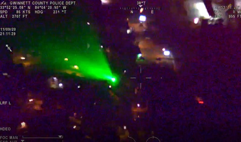 Gwinnett County man Fredy Contreras was arrested in 2020 and faced multiple charges after police caught him on video shining a green laser at a police helicopter.