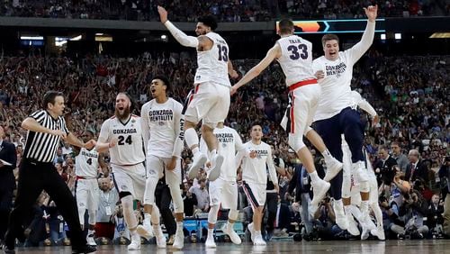 Gonzaga players celebrate after the semifinals of the Final Four against South Carolina on Saturday, April 1, 2017, in Glendale, Ariz. Gonzaga won 77-73. (AP Photo/David J. Phillip)