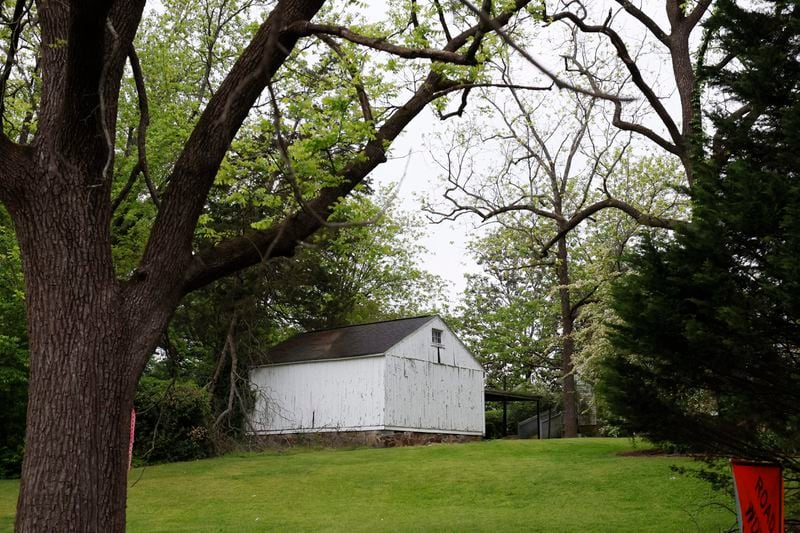 The 3-acre McAfee Historic House features a couple of barns in the backyard, where some interested people propose building a car wash.
Miguel Martinez /miguel.martinezjimenez@ajc.com
