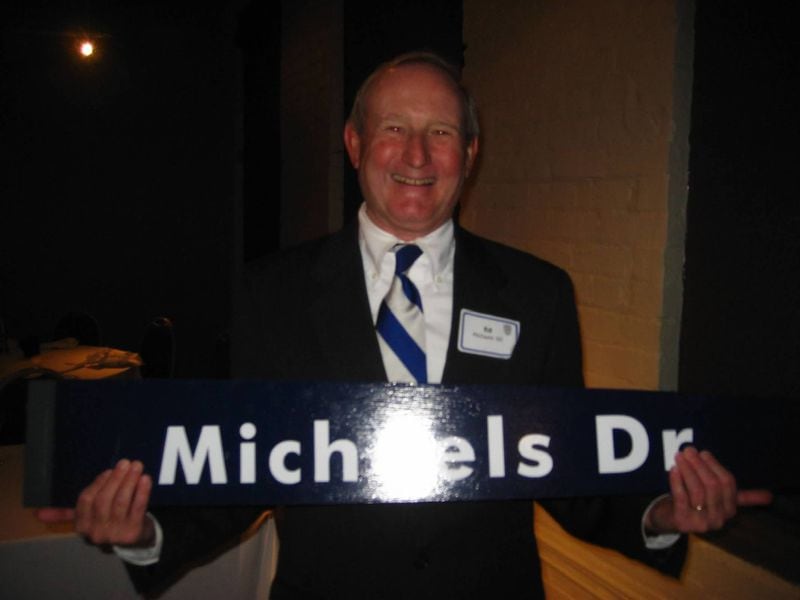 Ed Michaels being honored by the McCallie School in Tennessee when they named a Street on campus after him. He created a scholarship at the school that he attended. To date, more than 500 boys have been helped through the program.