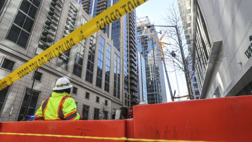February 19, 2021 Atlanta: A crane working on 31-story office tower in Midtown malfunctioned in February and was in danger of falling. Google plans to move into the 410-foot building later this year. (John Spink / John.Spink@ajc.com)