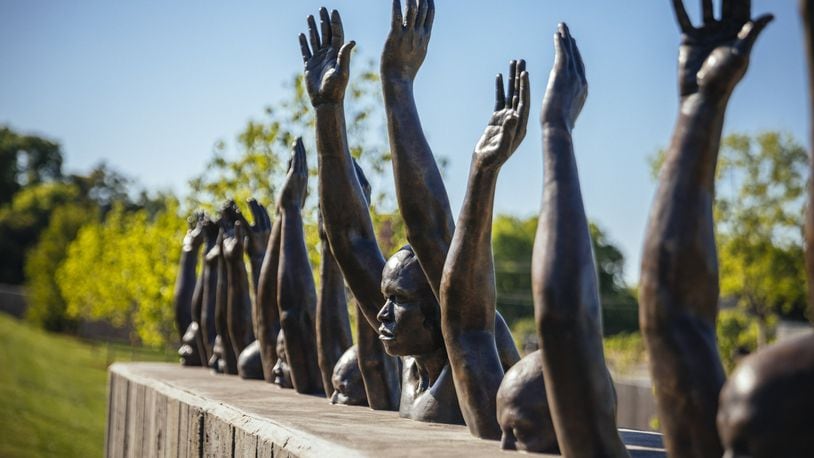 “Raise Up,” a sculpture by Hank Willis Thomas, on the grounds of the new National Memorial for Peace and Justice in Montgomery. (Audra Melton/The New York Times)