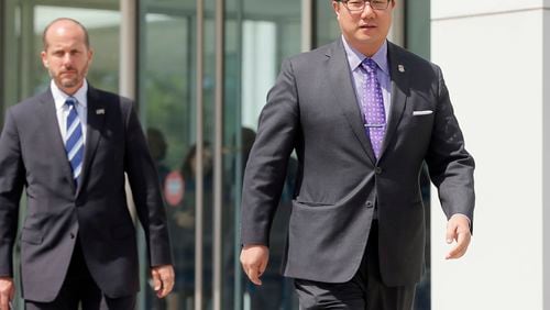 U.S. Attorney Byung J. “BJay” Pak (right) said defendant Timothy Cobb “gambled on getting away with his scheme, but he lost.” (BOB ANDRES /BANDRES@AJC.COM)