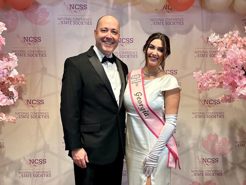 Georgia Attorney General Chris Carr with his daughter, Mary Clifton Carr, who represented the state at a recent Cherry Blossom Program.