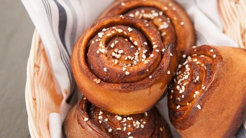 Andreas Muller's swedish cinnamon buns etebullar (wheat buns) are a staple of the Swedish kitchen and always on hand when you take a fika (coffee break). Revival executive chef Andreas Muller, who hails from Kristinehamn, Sweden, makes his vetebullar with cinnamon and cardamom and garnishes with pearl sugar. / Photo by Renee Brock/Special