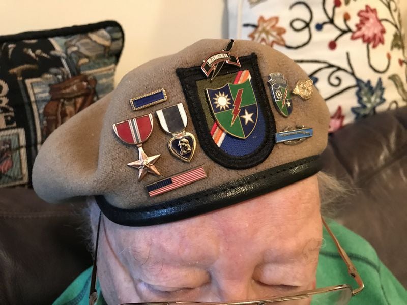 The Bronze Star and the patch from Merrill’s Marauders are among the medals that adorn Stanley Sasine’s jaunty beret. BO EMERSON / BEMERSON@AJC.COM