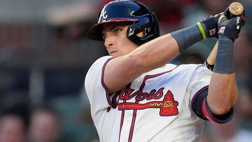Atlanta Braves' Austin Riley follows through on a base hit in the third inning of a baseball game against the Boston Red Sox Tuesday, May 7, 2024, in Atlanta. (AP Photo/John Bazemore)