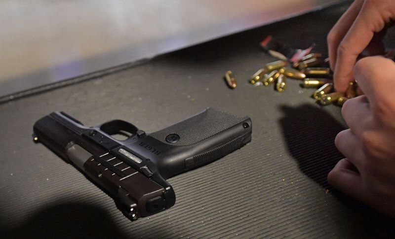 The number of new gun license applications fell roughly 60% after the new law allowing Georgians to carry concealed handguns without first getting a state license went into effect, Channel 2 Action News found. (Hyosub Shin / hyosub.shin@ajc.com)