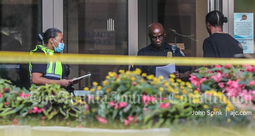 PHOTOS: Shooting at Midtown high-rise leaves 2 dead, including suspected gunman