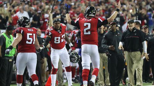 January 14, 2017, Atlanta: Falcons quarterback Matt Ryan plays the crowd urging them to cheering after tossing a touchdown pass to wide receiver Mohamed Sanu for a 36-13 lead over the Seahawks during the fourth quarter in a NFL football NFC divisional playoff game on Saturday, Jan. 14, 2017, in Atlanta. The Falcons beat the Seahawks 36-20. Curtis Compton/ccompton@ajc.com