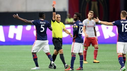 September 13, 2017 Atlanta. New England minefielder Xavier Kouassi (12). got rejected from the game for a rough play to a Atlanta United player.