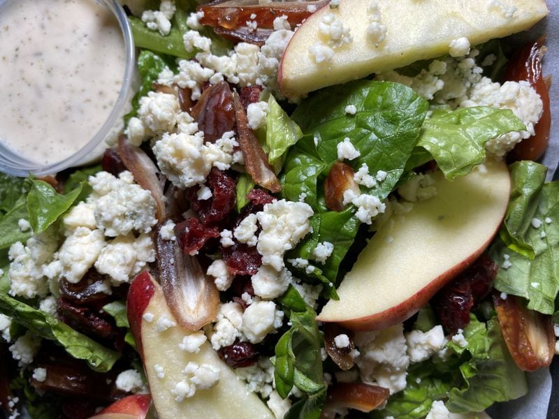 Ziba's Bistro apple salad with cranberries, dates, crumbled blue cheese, and creamy Italian dressing from Ziba's Restaurant in Grant Park. / Bob Townsend for the Atlanta Journal-Constitution.