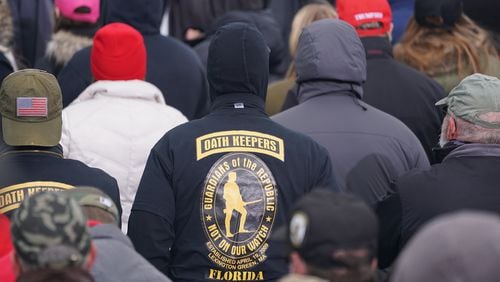 A member of the Oath Keepers looks on as supporters of Donald Trump attend a rally protesting the 2020 election results in Washington, DC., on January 6, 2021. (Bryan Smith/ZUMA Wire/TNS)