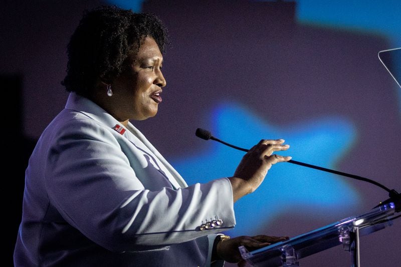 Gubernatorial candidate Stacey Abrams is facing challenges with voters of color — particularly attracting more Black men to the polls. She is pictured speaking at the Democratic Party of Georgia’s State Convention in Columbus on Saturday, August 27, 2022. (Steve Schaefer/steve.schaefer@ajc.com)