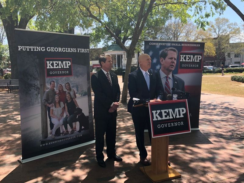 Then-Cobb District Attorney Vic Reynolds and Secretary of State Brian Kemp unveil an anti-gang initiative that was a key part of Kemp's campaign for Georgia governor. Kemp named Reynolds head of the Georgia Bureau of Investigation, which is pushing an anti-gang agenda. AJC/Greg Bluestein