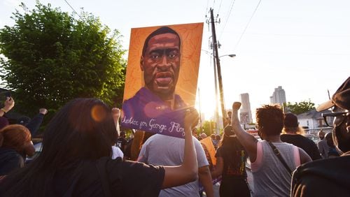 Atlanta marchers take to the streets Tuesday, April 20, 2021, after the guilty verdict of Derek Chauvin, the ex-police officer who killed George Floyd. Floyd’s murder touched off a wave of global protests last year. (Hyosub Shin / Hyosub.Shin@ajc.com)