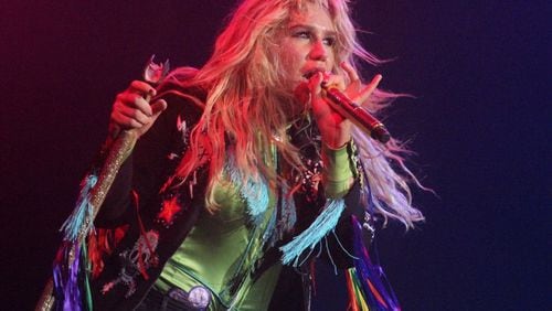 Kesha teams up with Macklemore for a nine-week tour that brings the two to the Cellairis Amphitheatre at Lakewood today. Contributed by Melissa Ruggieri/AJC