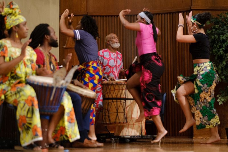 Romero Beverly (center) is seen playing the dunun drum set at a performance at Spelman College in Atlanta on Wednesday, April 27, 2022. Beverly will perform in “Soaring High.” (Arvin Temkar / arvin.temkar@ajc.com)