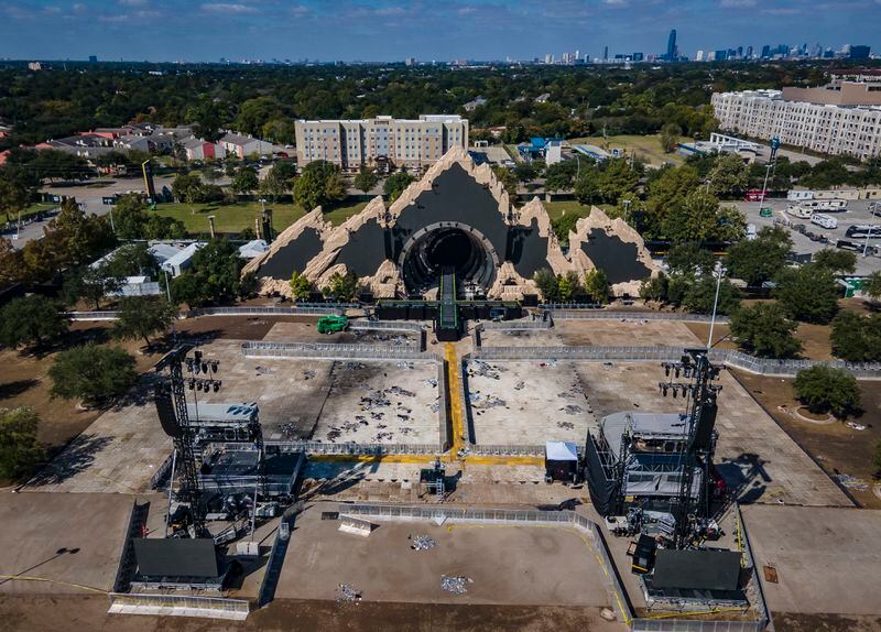 FILE - The Astroworld main stage where a surging crowd killed several people, sits full of debris from the concert, in a parking lot at NRG Center on Nov. 8, 2021, in Houston. Nine of the 10 wrongful death lawsuits filed after the deadly crowd surge have been settled, including one that was set to go to trial this week, an attorney said Wednesday, May 8, 2024. (Mark Mulligan/Houston Chronicle via AP, File)