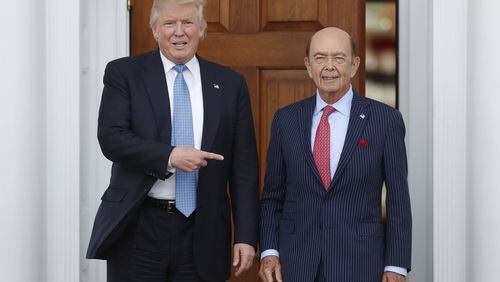 President-elect Donald Trump, left, stands with investor Wilbur Ross after meeting at the Trump National Golf Club Bedminster clubhouse in Bedminster, N.J. recently. (AP Photo/Carolyn Kaster)