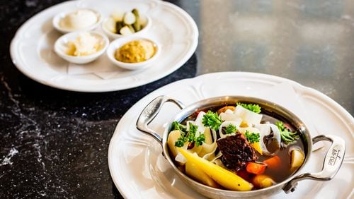 Pot-au-feu (French beef stew) at By George is wonderful as comfort food. CONTRIBUTED BY HENRI HOLLIS