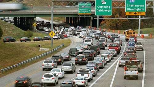 Certain lanes in the vicinity of Ga. 400 and I-285 in the Sandy Springs-Dunwoody area will be closed overnight in the coming days as GDOT prepares to reconstruct the interchange. AJC FILE