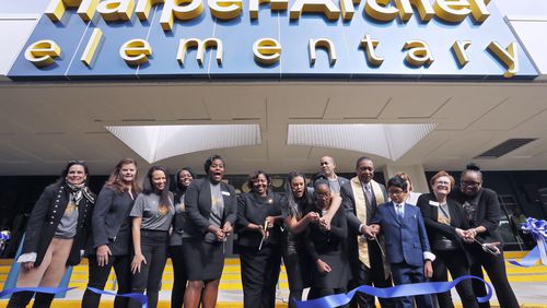 November 7, 2019 - Atlanta - Atlanta Public Schools Superintendent Meria Carstarphen (center), along with Harper Archer Principal, Dr. Dione Simon Taylor, school board menbers and students, held a ribbon cutting to celebrate the opening of the school.  Carstarphen delivered her final State of the District address at the newly renovated Harper-Archer Elementary School.  The theme of this year's address was"The Epic of APS." The program also included a ribbon cutting celebrating the opening of the newly renovated school.  Bob Andres / robert.andres@ajc.com