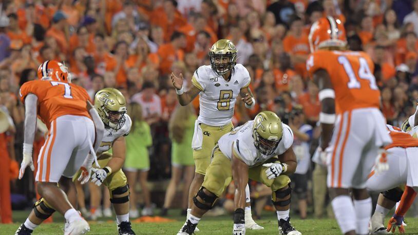 Georgia Tech quarterback Tobias Oliver (8) shouts instructions in the first half at Memorial Stadium on the Clemson University campus in Clemson, S.C. on Thursday, August 29, 2019. Georgia Tech took the field for the first time with Geoff Collins as head coach. (Hyosub Shin / Hyosub.Shin@ajc.com)