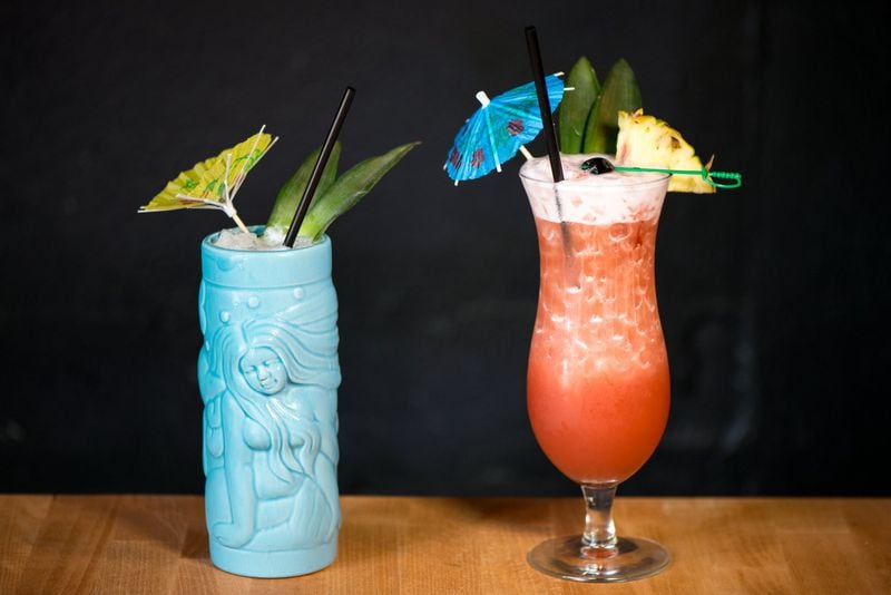 Double Dragon Tradewinds cocktail (left) and Singapore Sling cocktail (right). / Photo credit- Mia Yakel.