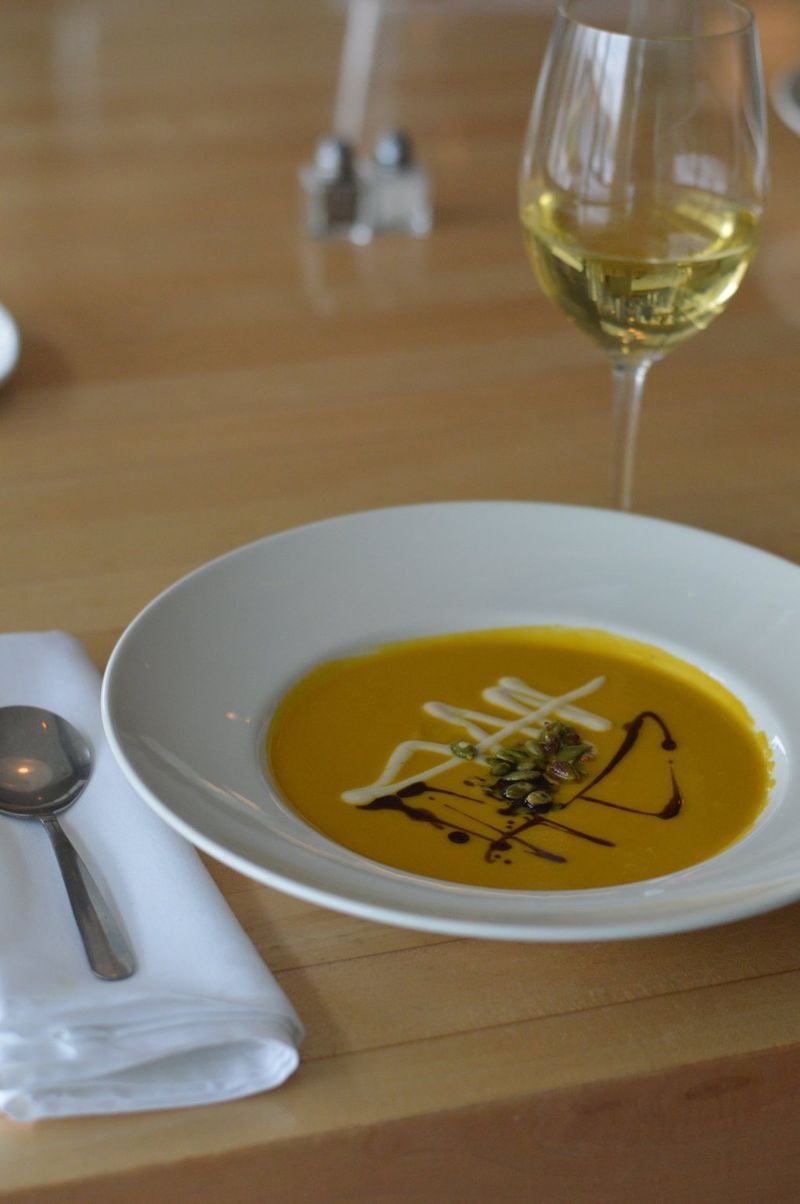 Seed Kitchen & Bar’s Butternut Squash Soup is elegantly finished with maple crema, pumpkin oil and roasted pumpkin seeds. CONTRIBUTED BY HENRI HOLLIS