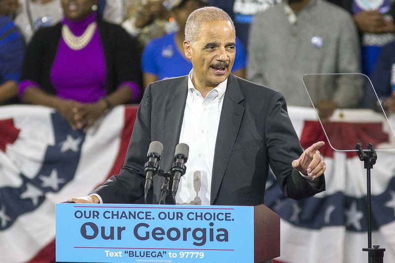 Former U.S. Attorney General Eric Holder speaks during a rally for gubernatorial candidate Stacey Abrams in Forbes Arena at Morehouse College, Friday, November 2, 2018.  (ALYSSA POINTER/ALYSSA.POINTER@AJC.COM)