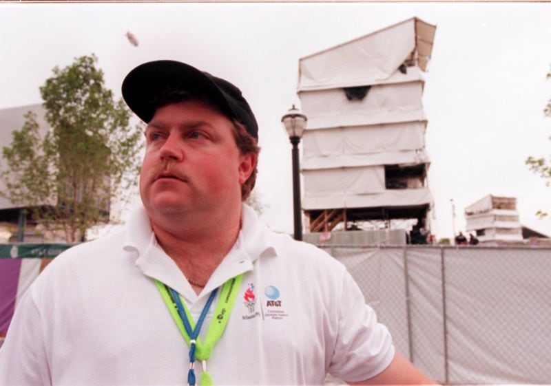 Security guard and hero Richard Jewell poses on Sunday, July 28, 1996 across from the tower where he found a bomb and warned visitors at Centennial Olympic Park during the 1996 Summer Olympic Games in Atlanta, Georgia. (AJC Staff Photo/William Berry) 7/96