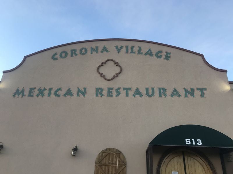 On a 1,900-mile drive back to Atlanta during the coronavirus pandemic, Ligaya Figueras and her family stopped at a hotel with no overnight staff due to layoffs. Figueras writes that “it felt like a cruel joke that the restaurant next to the hotel was called Corona Village.” LIGAYA FIGUERAS / LIGAYA.FIGUERAS@AJC.COM