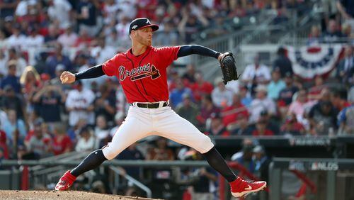 Braves starting pitcher Mike Foltynewicz delivers  during Game 2 of the NLDS at SunTrust Park  on Friday.