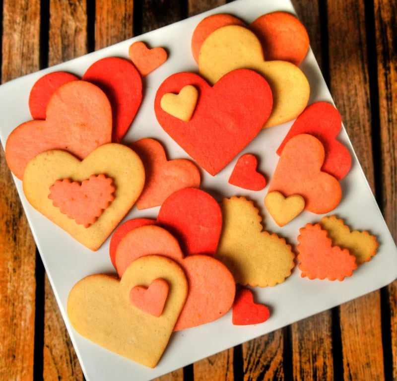 With food coloring and different-sized cookie cutters, you can make an assortment of the Orange Sugar Cookies developed by Canoe pastry chef Jessica McKinney. (Styling by Jessica McKinney / Chris Hunt for the AJC)