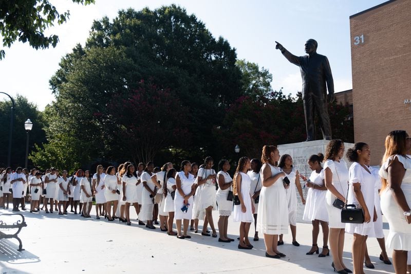 First-year Spelman students line up before a joint convocation with Morehouse at the Martin Luther King Jr. International Chapel in Atlanta on Sunday, Aug. 13, 2023.   (Ben Gray / Ben@BenGray.com)