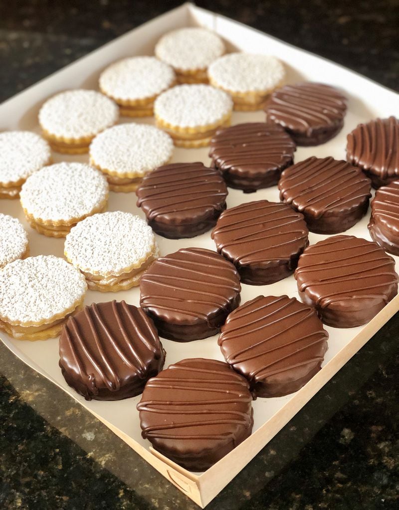 Alfajores are butter sandwich cookies filled with dulce de leche. Pastil Artisan Bakery sells a classic version, as well as one coated in chocolate. Courtesy of Nicole Benza