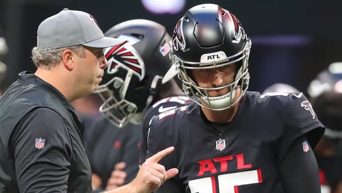 Falcons head coach Arthur Smith confers with backup quarterback Josh Rosen as they prepare to play the Cleveland Browns the final exhibition game of the preseason Sunday, Aug. 29, 2021, at Mercedes-Benz Stadium in Atlanta. (Curtis Compton / Curtis.Compton@ajc.com)