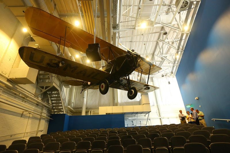 A Northwest Airways Waco 125 hangs over an auditorium in the Delta Flight Museum in Atlanta. This rare version of the popular Waco 10 biplane has a Siemens-Halske SH-12 engine. Only about 21 of the planes were built, and this is the only one remaining. CURTIS COMPTON / CCOMPTON@AJC.COM