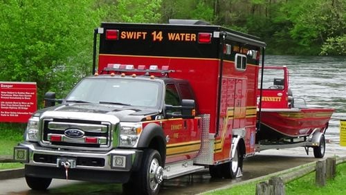 Gwinnett County Fire and Emergency Services rescued four men who were stranded in the Chattahoochee River on Saturday.