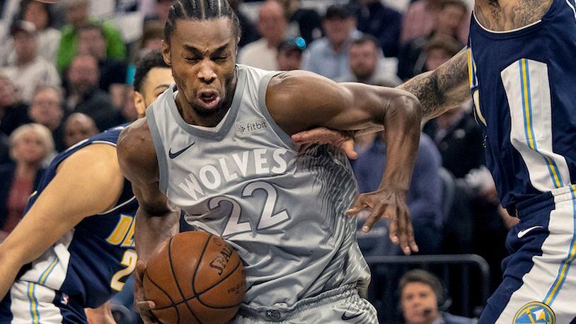 The Minnesota Timberwolves' Andrew Wiggins (22) drives to the basket in the first quarter against the Denver Nuggets on Wednesday, April 11, 2018, at the Target Center in Minneapolis. (Carlos Gonzalez/Minneapolis Star Tribune/TNS)